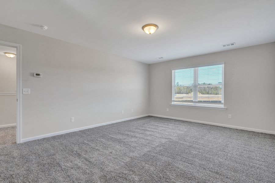 Spacious, unfurnished interior of a new home in Heritage at New Riverside, Bluffton (Image 25).