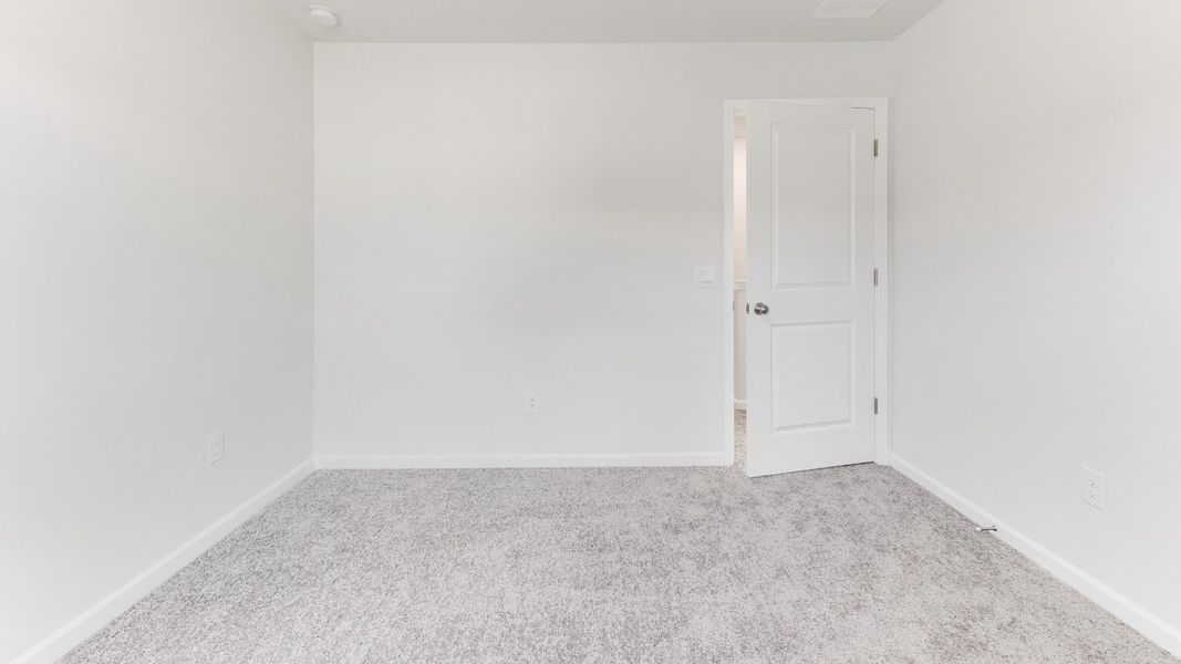 Representative unfurnished interior of a home built from the HAYDEN by D.R. Horton in Sidbury Station, Castle Hayne (Image 25).