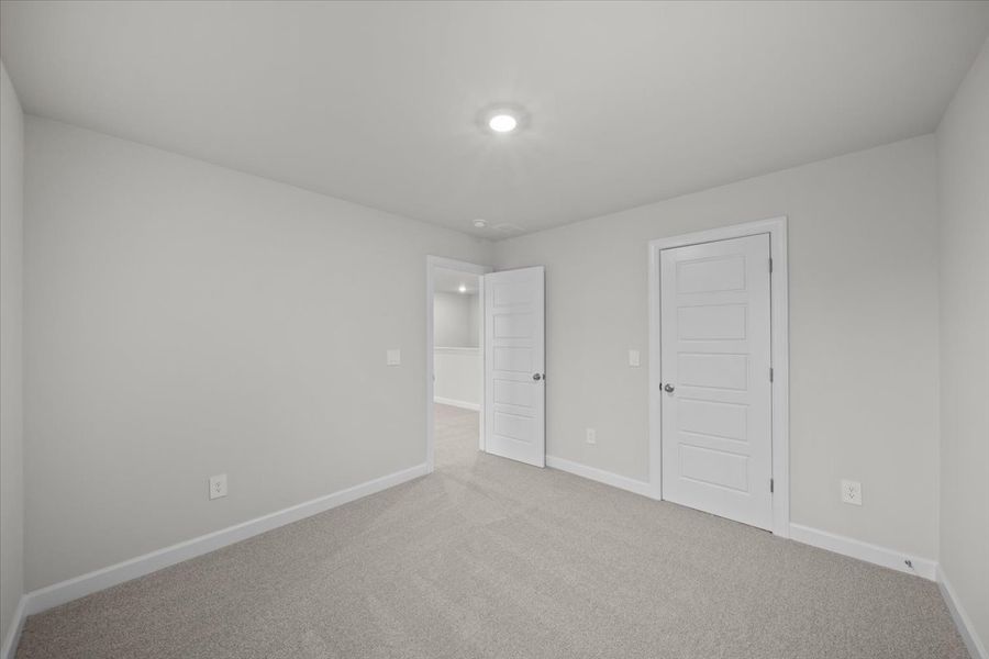 Spacious, unfurnished interior of a new home in The Farm at Wells Creek - Signature Collection, Gray Court (Image 19).