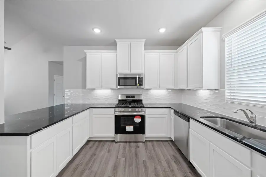 Furnished interior view inside a new home in Sunterra, Katy (Image 10). Furnished interior view inside a new home in Sunterra, Katy (Image 10).