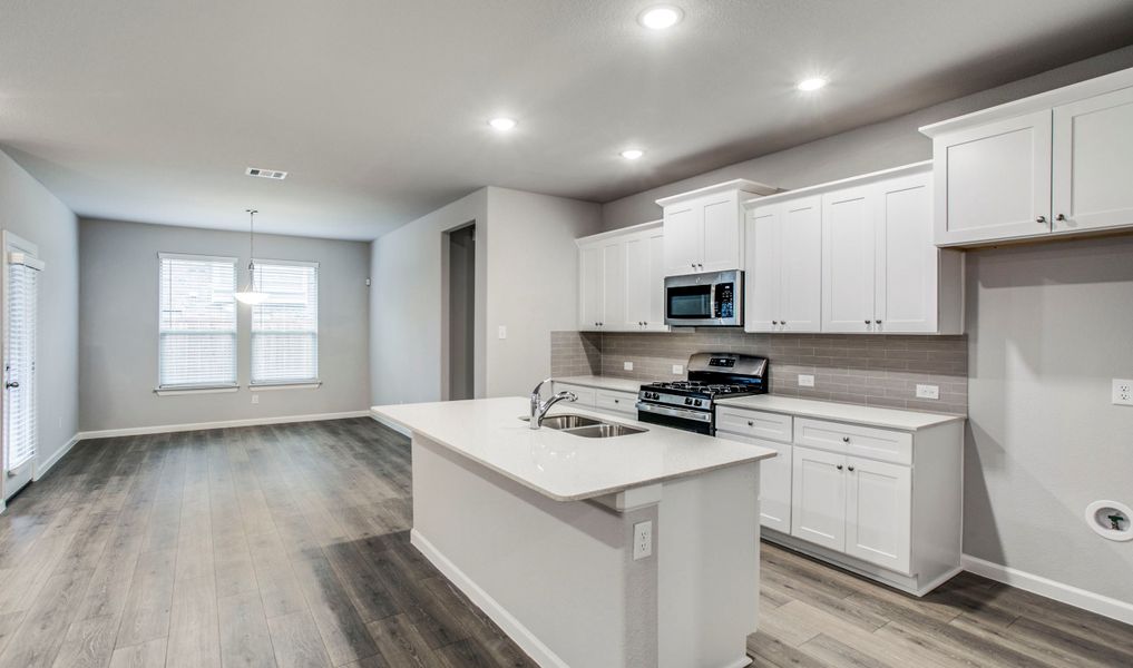 Kitchen adjacent to dining area