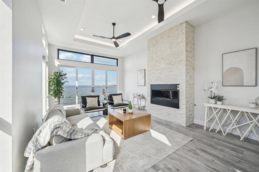 Enter into your serene modern escape on Lake Ray Hubbard where you'll find 12 foot ceilings on the first floor, floor to ceiling windows, and designer finishes in a stunning neutral palette.