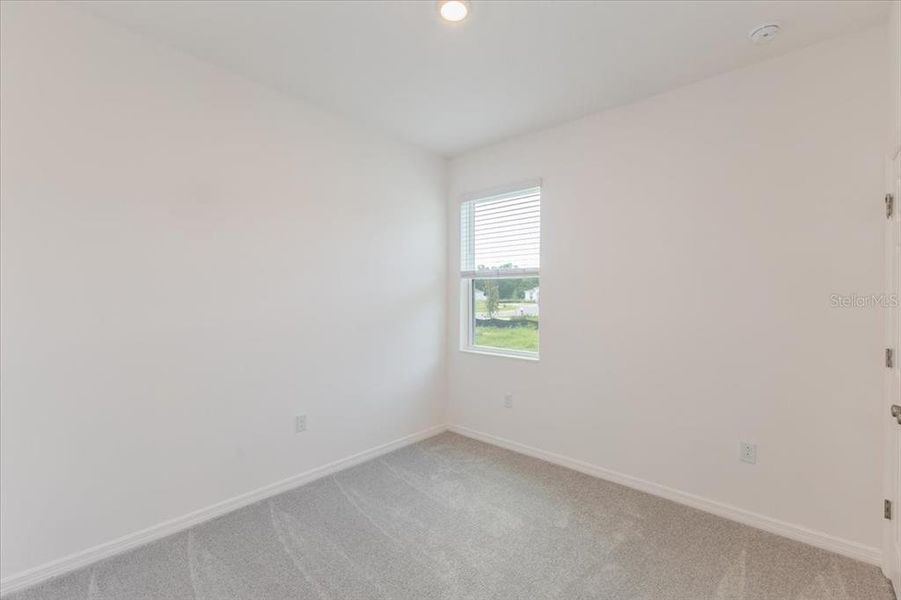 Spacious, unfurnished interior of a new home in Liberty Station, Orange City (Image 6).