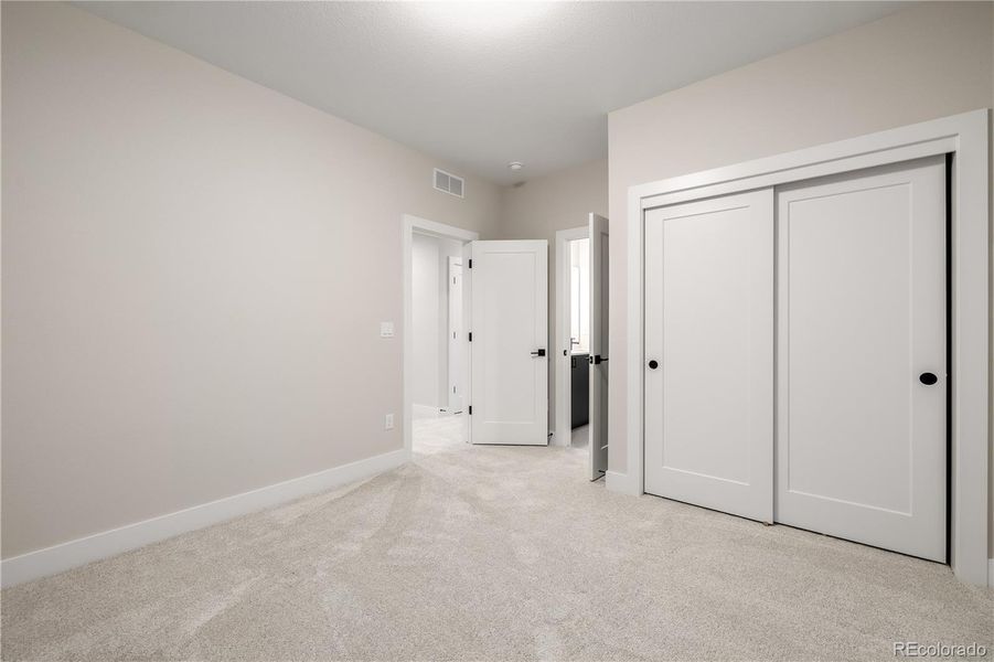 Spacious, unfurnished interior of a new home in West Grange, Longmont (Image 47).