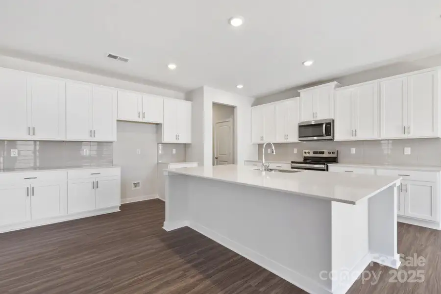 Furnished interior view inside a new home in Running Creek, Locust (Image 5).