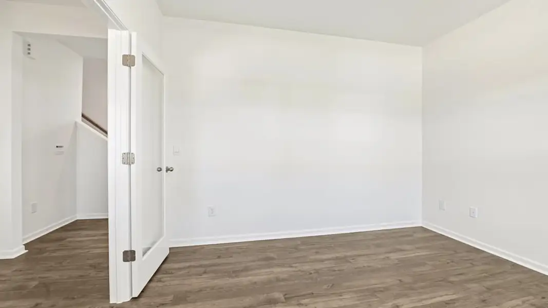 Spacious, unfurnished interior of a new home in Shahbain Reserve, Raeford (Image 18). Spacious, unfurnished interior of a new home in Shahbain Reserve, Raeford (Image 18).
