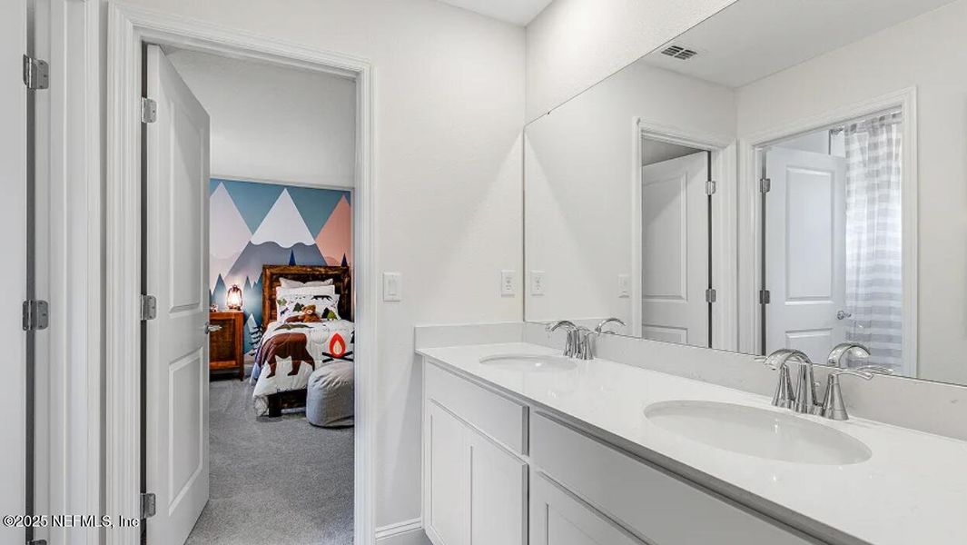 Furnished interior view inside a new home in Russell Retreat, Green Cove Springs (Image 7).