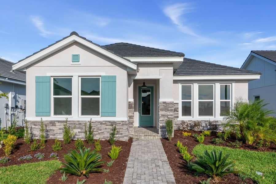 Representative exterior photo of a completed home built from the The Langham by David Weekley Homes in Vistera of Venice – Cottage Series, Nokomis, FL (Image 2).
