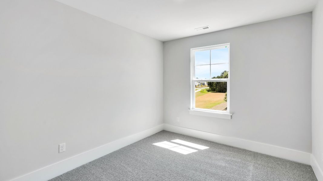 Spacious, unfurnished interior of a new home in The Pines at Blake Farm, Wilmington (Image 24).