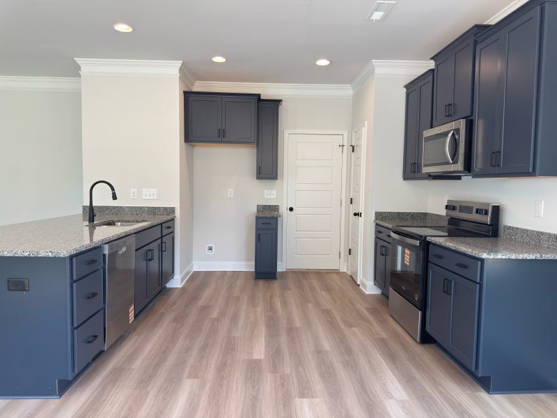 Furnished interior view inside a new home in Miller's Reserve, Winston-Salem (Image 6).