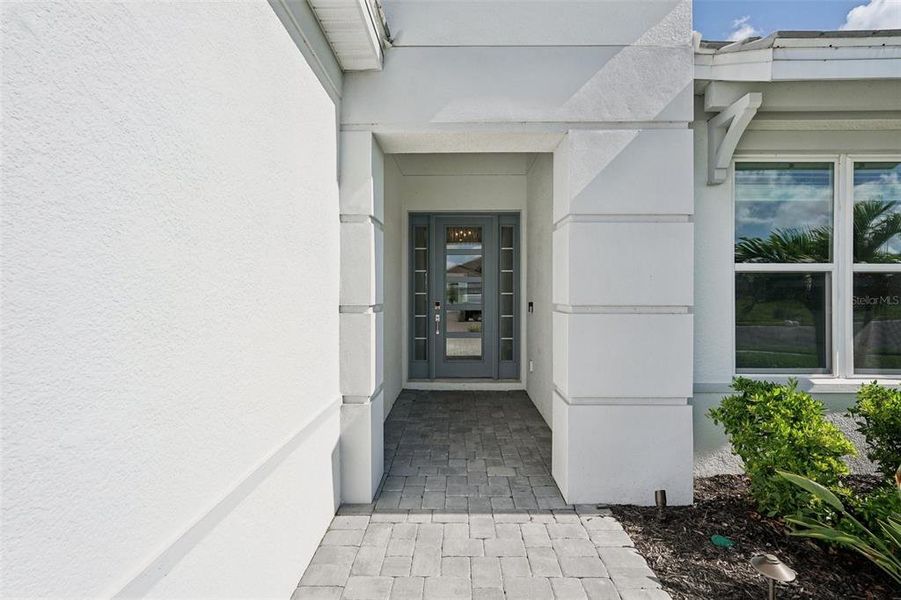Exterior details and patio area of a home in Esplanade at Azario Lakewood Ranch, Bradenton (Image 28).