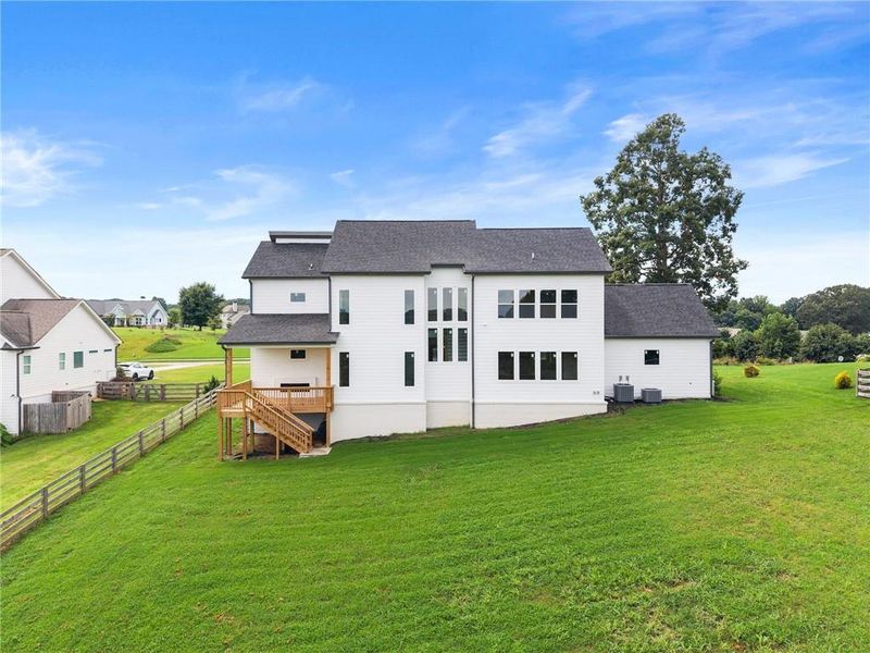 Front exterior of a new home in , Clermont, GA, highlighting curb appeal (Image 28).