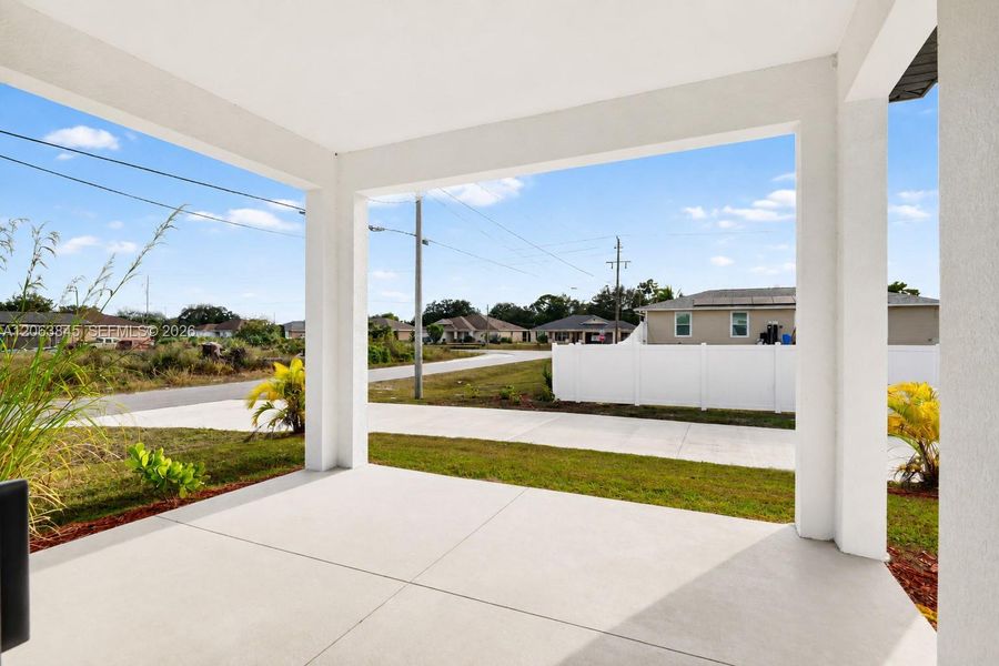 Exterior details and patio area of a home in , Lehigh Acres (Image 4).