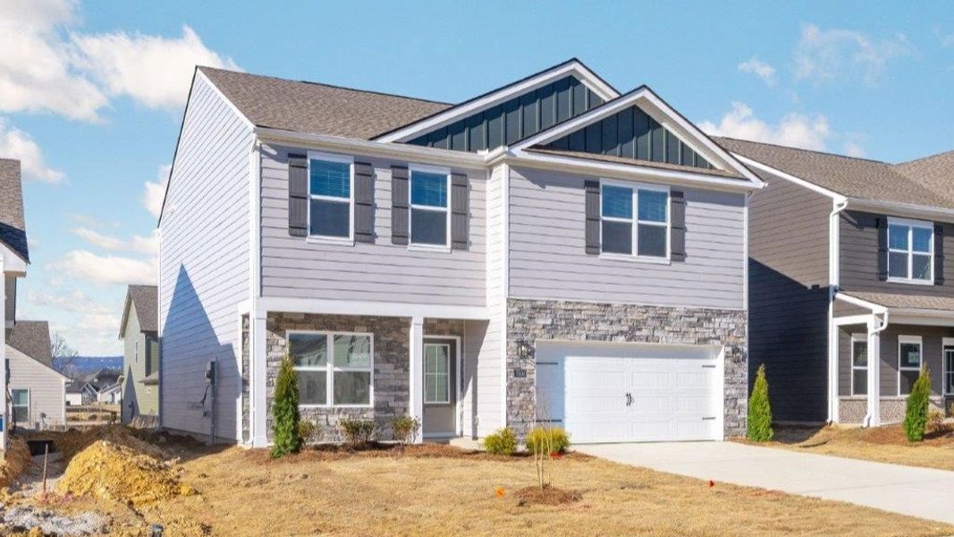 Front exterior of a new home in The Cove at Thrasher Landing, Hixson, TN, highlighting curb appeal (Image 2).