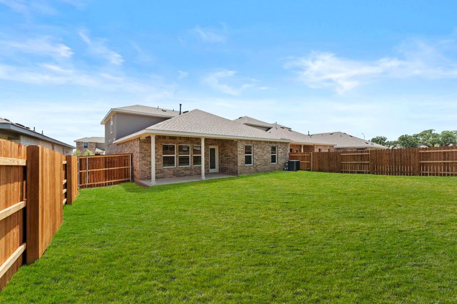 Exterior details and patio area of a home in Bar W Ranch, Leander (Image 3). Exterior details and patio area of a home in Bar W Ranch, Leander (Image 3).