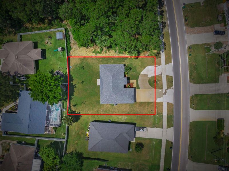 Front exterior of a new home in , Port St. Lucie, FL, highlighting curb appeal (Image 2).