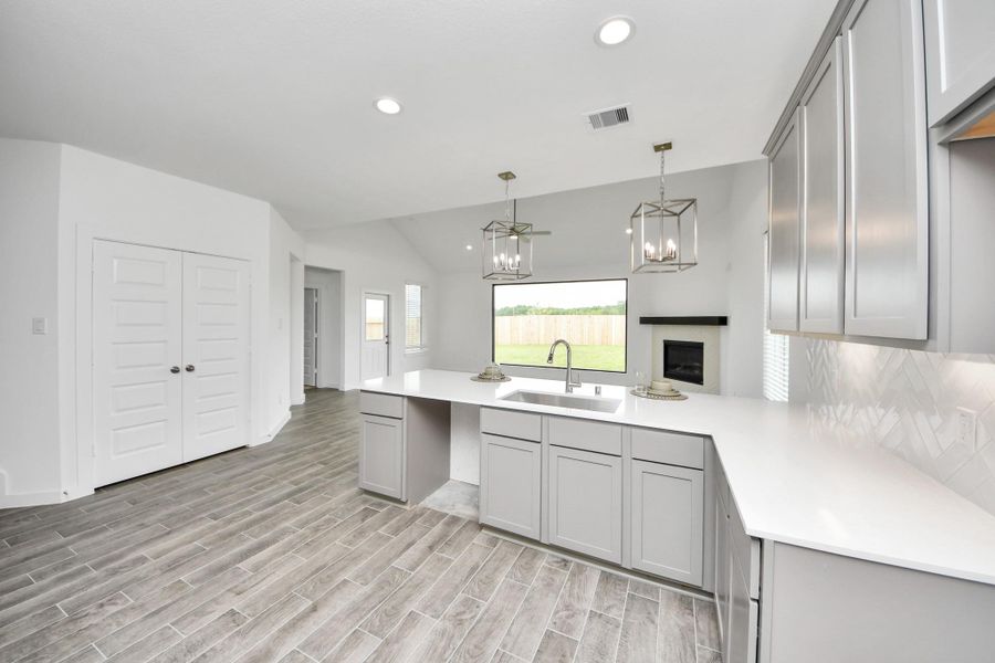 This generously spacious kitchen is a dream realized! Sample photo of completed home with similar floor plan. Actual colors and selections may vary.