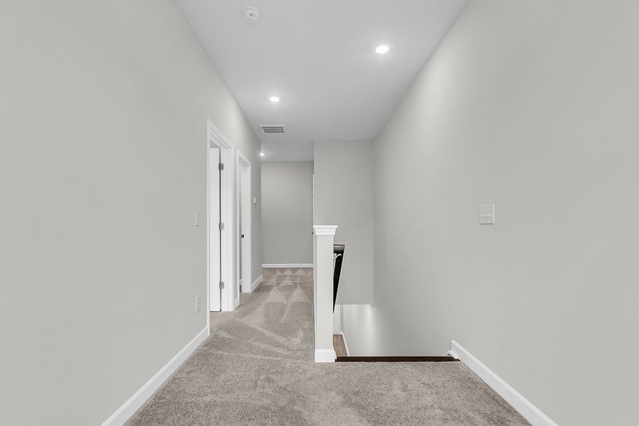 Spacious, unfurnished interior of a new home in Pineland Preserve, Summerville (Image 31).