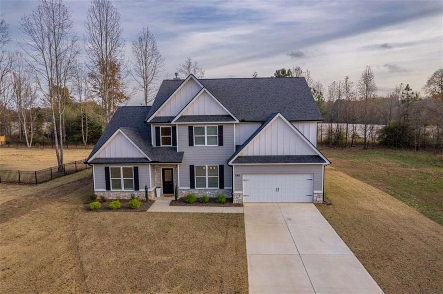 Front exterior of a new home in , Good Hope, GA, highlighting curb appeal (Image 29).