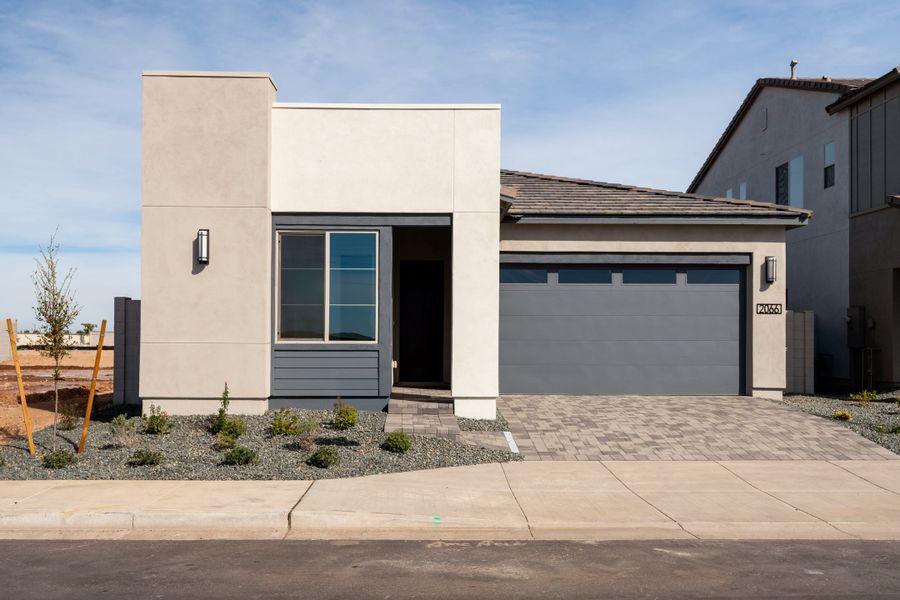 Front exterior of a new home in Soleo, San Tan Valley, AZ, highlighting curb appeal (Image 1). Front exterior of a new home in Soleo, San Tan Valley, AZ, highlighting curb appeal (Image 1).