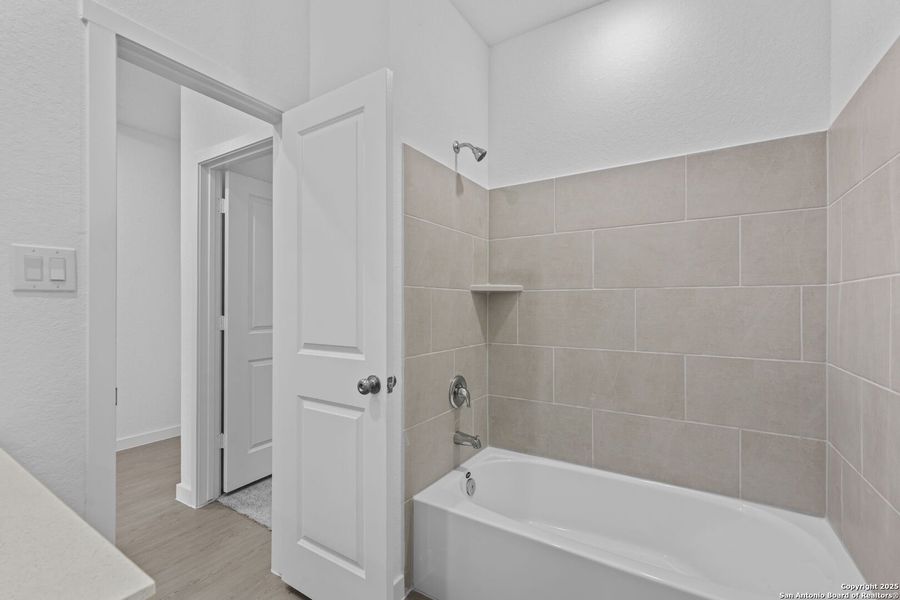 Furnished interior view inside a new home in Waterwheel: Coastline Collection, San Antonio (Image 7).