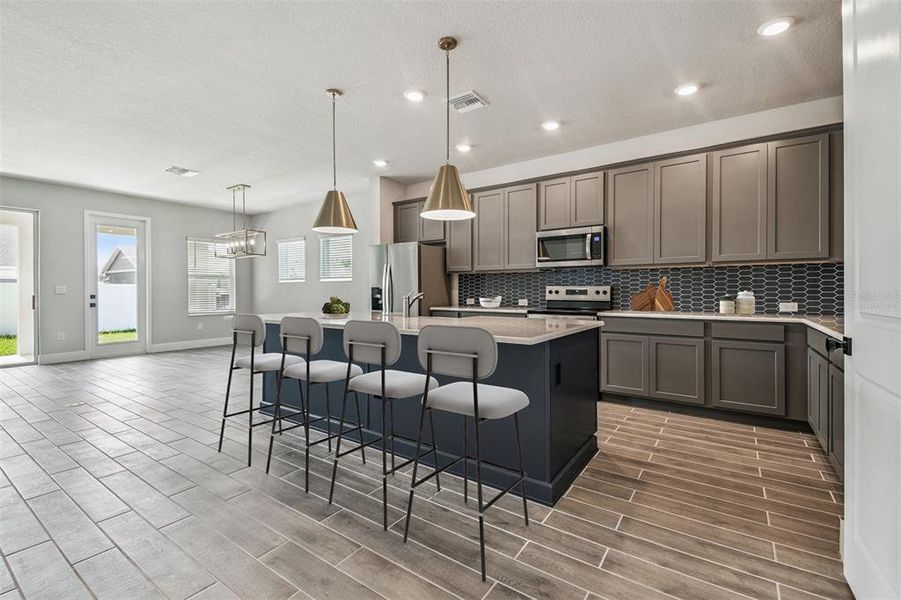 Furnished interior view inside a new home in The Peninsula at Rhodine Lake, Riverview (Image 14). Furnished interior view inside a new home in The Peninsula at Rhodine Lake, Riverview (Image 14).