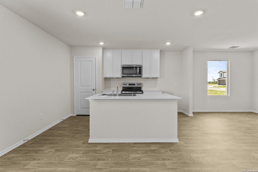 Furnished interior view inside a new home in Swenson Heights, Seguin (Image 5).