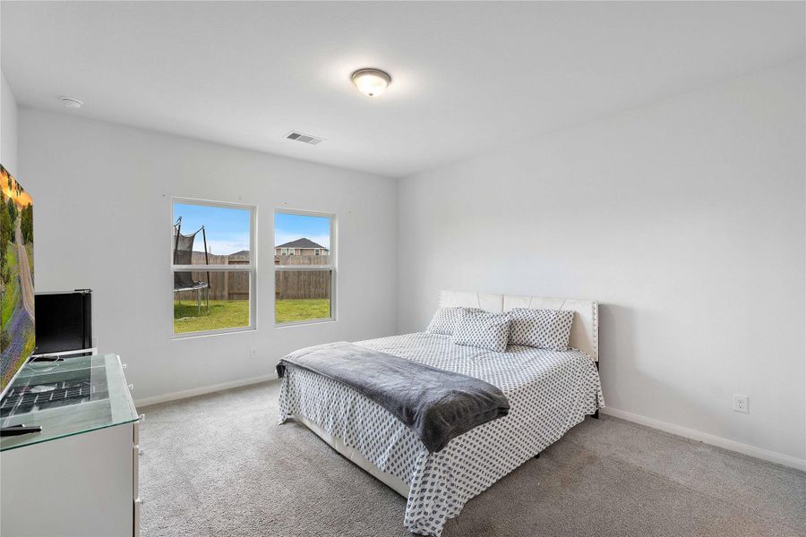 Furnished interior view inside a new home in Sweetgrass Village, Crosby (Image 14).