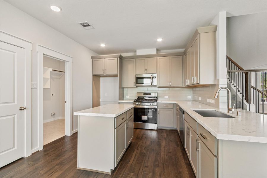 Furnished interior view inside a new home in Sunterra, Katy (Image 14).