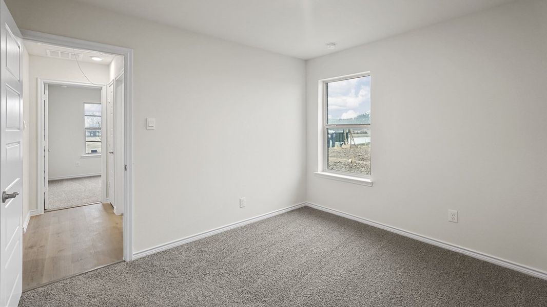 Spacious, unfurnished interior of a new home in Woodcreek, Fate (Image 12).