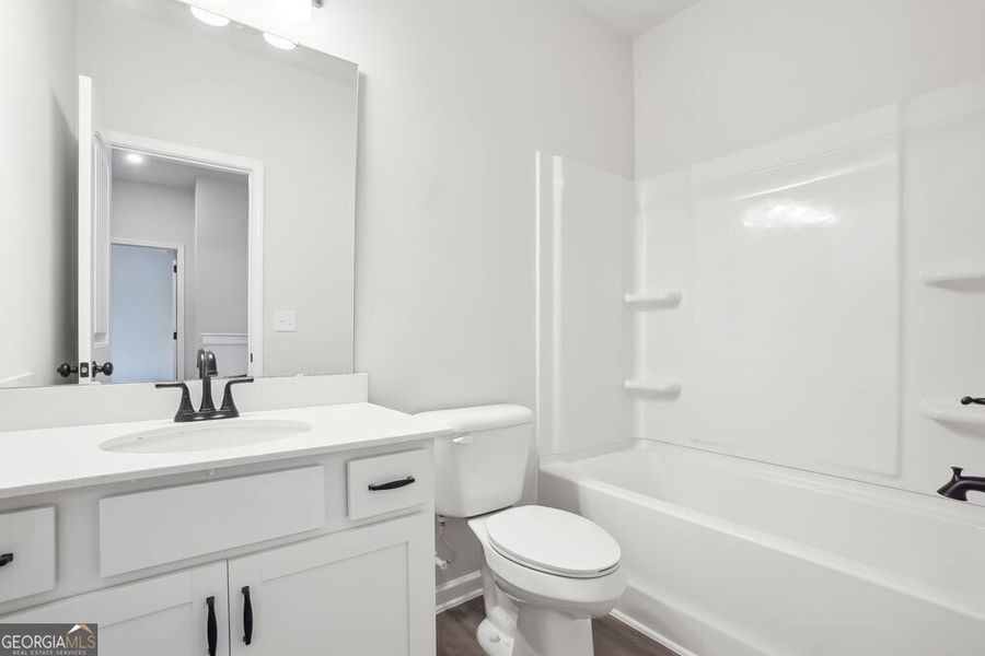Furnished interior view inside a new home in Stonebridge North, Macon (Image 6).