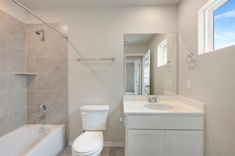 Furnished interior view inside a new home in Heritage, Dripping Springs (Image 6).