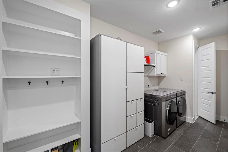 Access the laundry from either the front entry or a secret passageway from the primary walk-in closet.