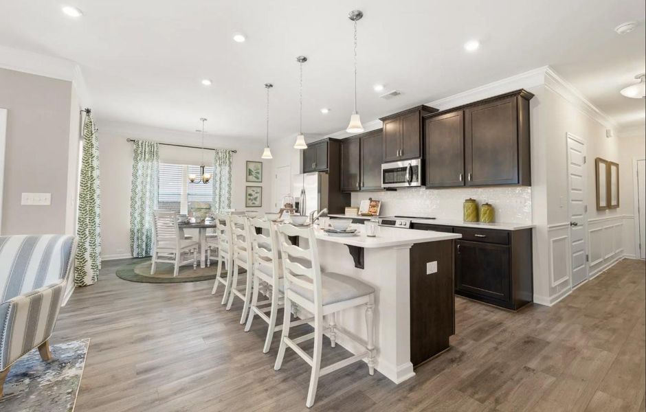 The Brambling- Kitchen. Home under construction. Sample photo used for illustrative purposes only, elevation, upgrades, selection, brick, siding and colors will vary. The Brambling- Kitchen. Home under construction. Sample photo used for illustrative purposes only, elevation, upgrades, selection, brick, siding and colors will vary.