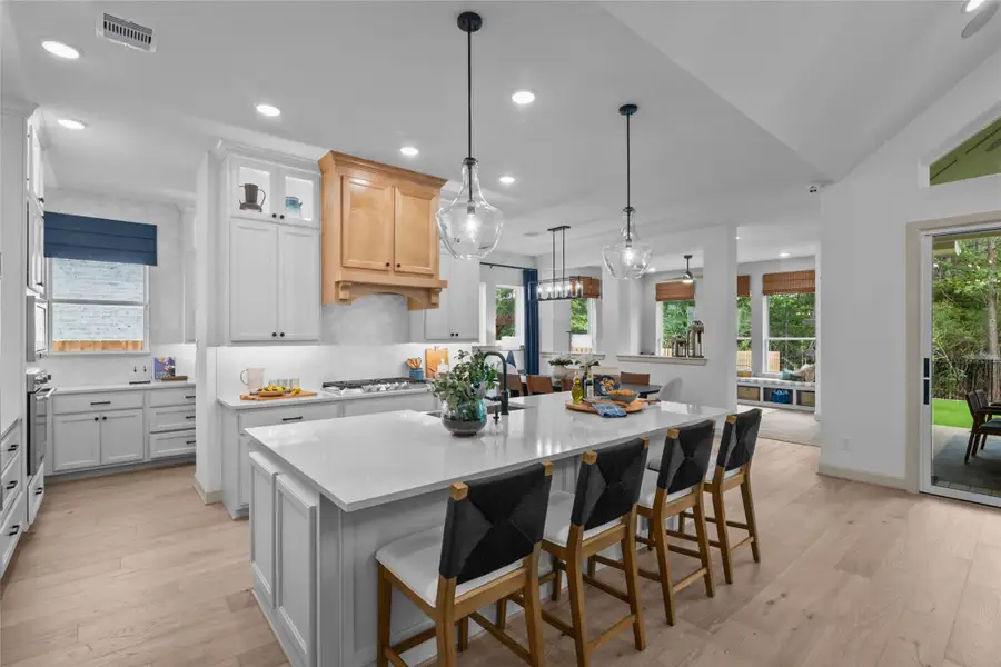 .REPRESENTATIVE PHOTO:  Gorgeous Kitchen with cabinets to ceiling, GE Cafe appliances w/updraft vent hood, 36 in gas c-top, soft close drawers/doors & quartz counters