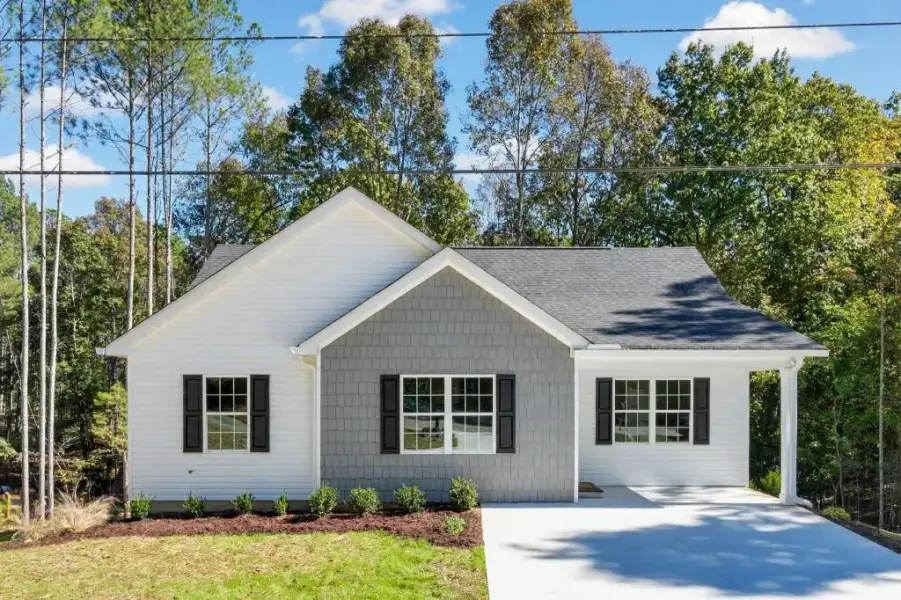 Front exterior of a new home in , Lula, GA, highlighting curb appeal (Image 22).