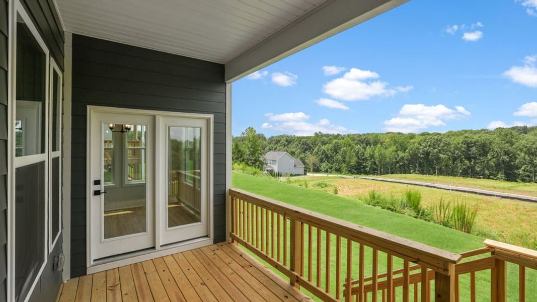 Exterior details and patio area of a home in Sunset Summits, Spartanburg (Image 23).