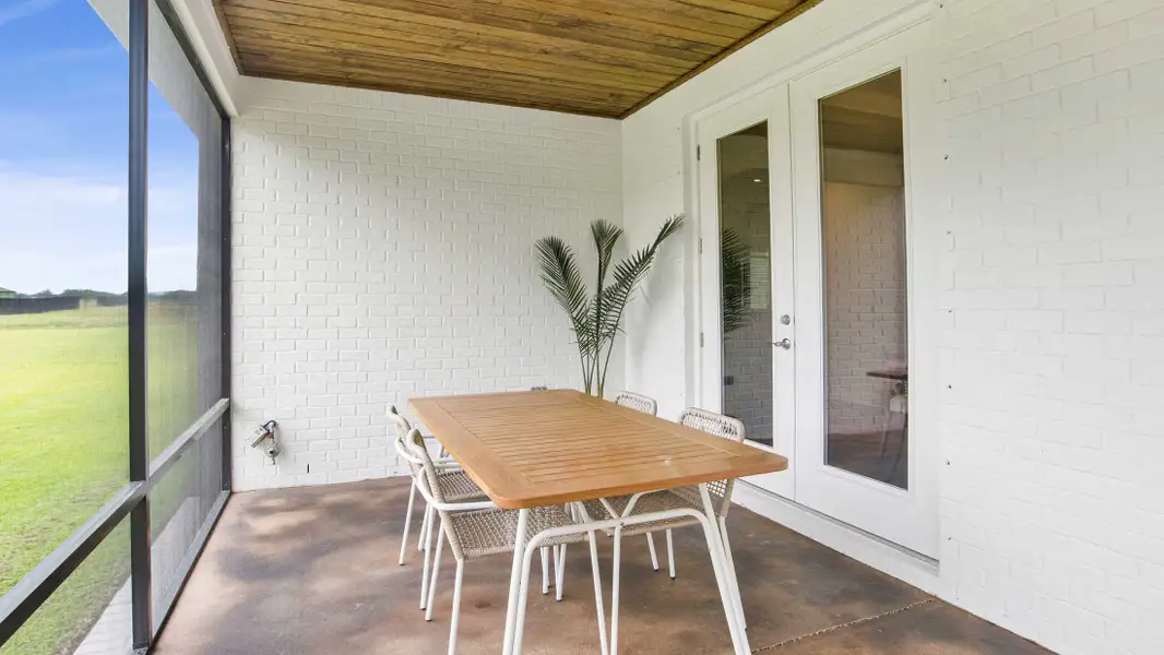 Exterior details and patio area of a home in Golden Gate, Naples (Image 24).