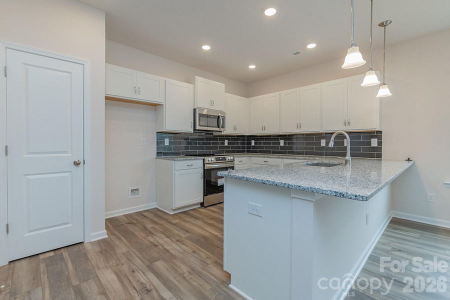 Furnished interior view inside a new home in Country Club Village, Salisbury (Image 6).