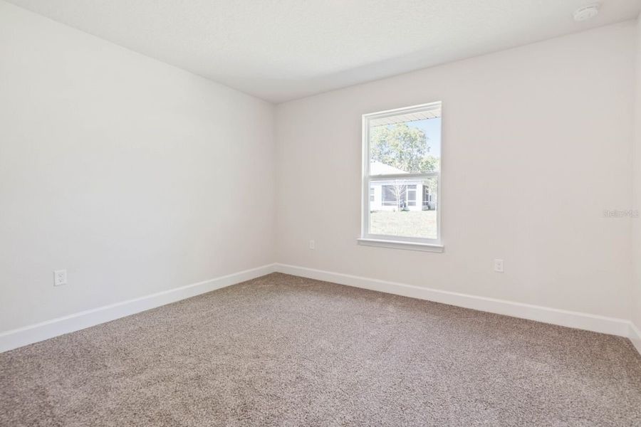 Representative unfurnished interior of a home built from the 1755 by Adams Homes in Okeechobee, Okeechobee (Image 24).