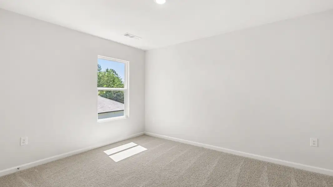 Representative unfurnished interior of a home built from the Belfort by D.R. Horton in Braselton Village, Braselton (Image 25).
