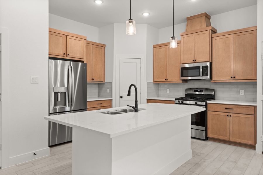 Furnished interior view inside a new home in Meridiana, Manvel (Image 4).