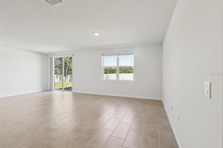 Spacious, unfurnished interior of a new home in Bradbury Creek - Signature Series, Haines City (Image 17).