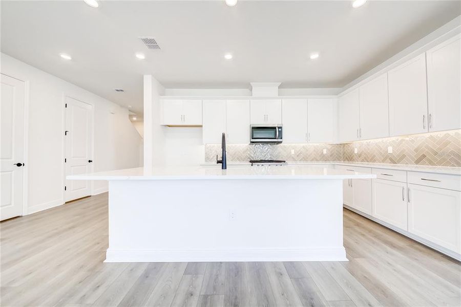 Furnished interior view inside a new home in Bungalow Walk at Lakewood Ranch, Sarasota (Image 6).