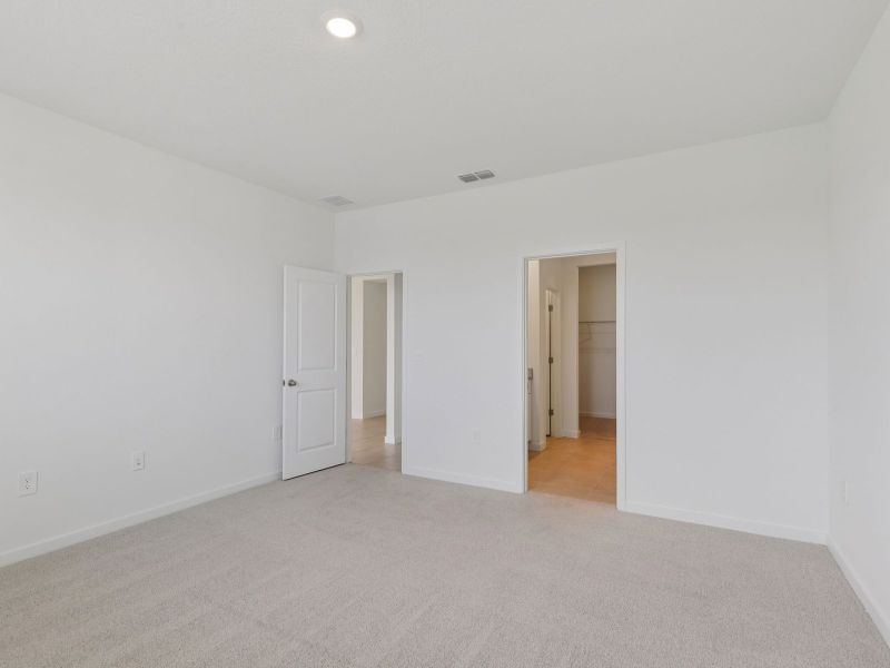 Spacious, unfurnished interior of a new home in Lakes at Bella Lago - Signature Series, Green Cove Springs (Image 13).