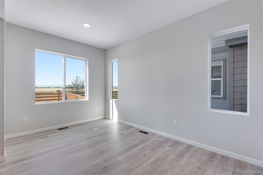 Spacious, unfurnished interior of a new home in Reunion Ridge, Commerce City (Image 28).