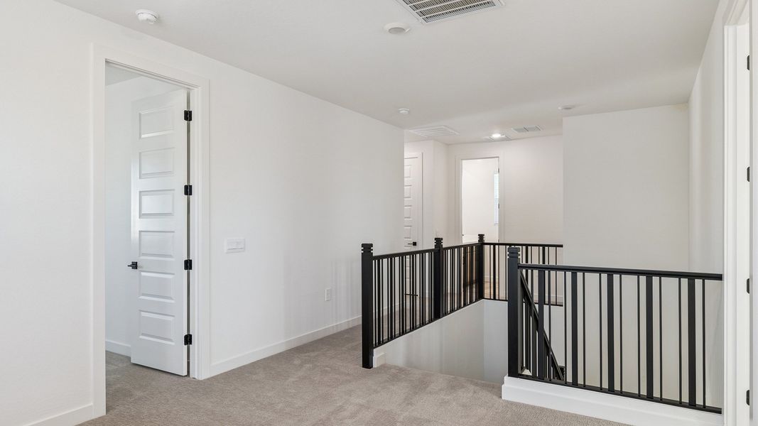 Representative furnished interior of a home built from the Crow by D.R. Horton in The Ridge at Stone Butte, Phoenix (Image 12).