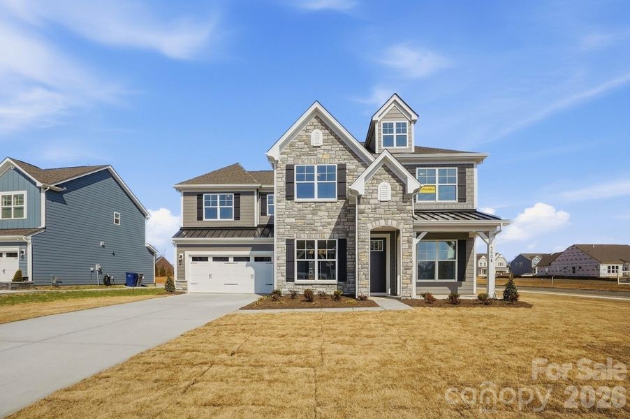Front exterior of a new home in Harmony, Harrisburg, NC, highlighting curb appeal (Image 2).