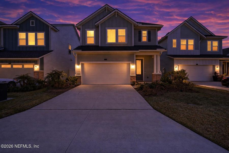 Front exterior of a new home in Granville at eTown 38', Jacksonville, FL, highlighting curb appeal (Image 26).