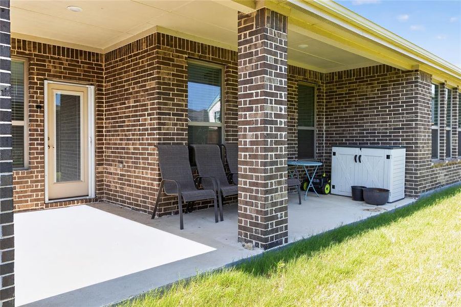 Exterior details and patio area of a home in , Little Elm (Image 3). Exterior details and patio area of a home in , Little Elm (Image 3).